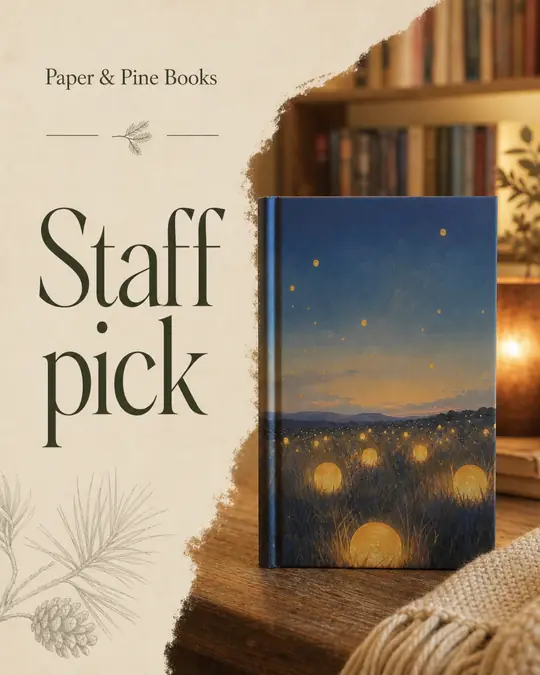 Example post: Staff pick in elegant lettering beside a navy hardback with a starry cover, on a wooden table in front of bookshelves
